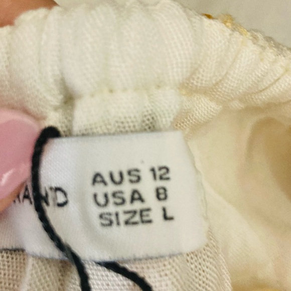 Faithfull the Brand “la puede a” linen halter maxi dress in yellow print. 8 - Picture 12 of 13